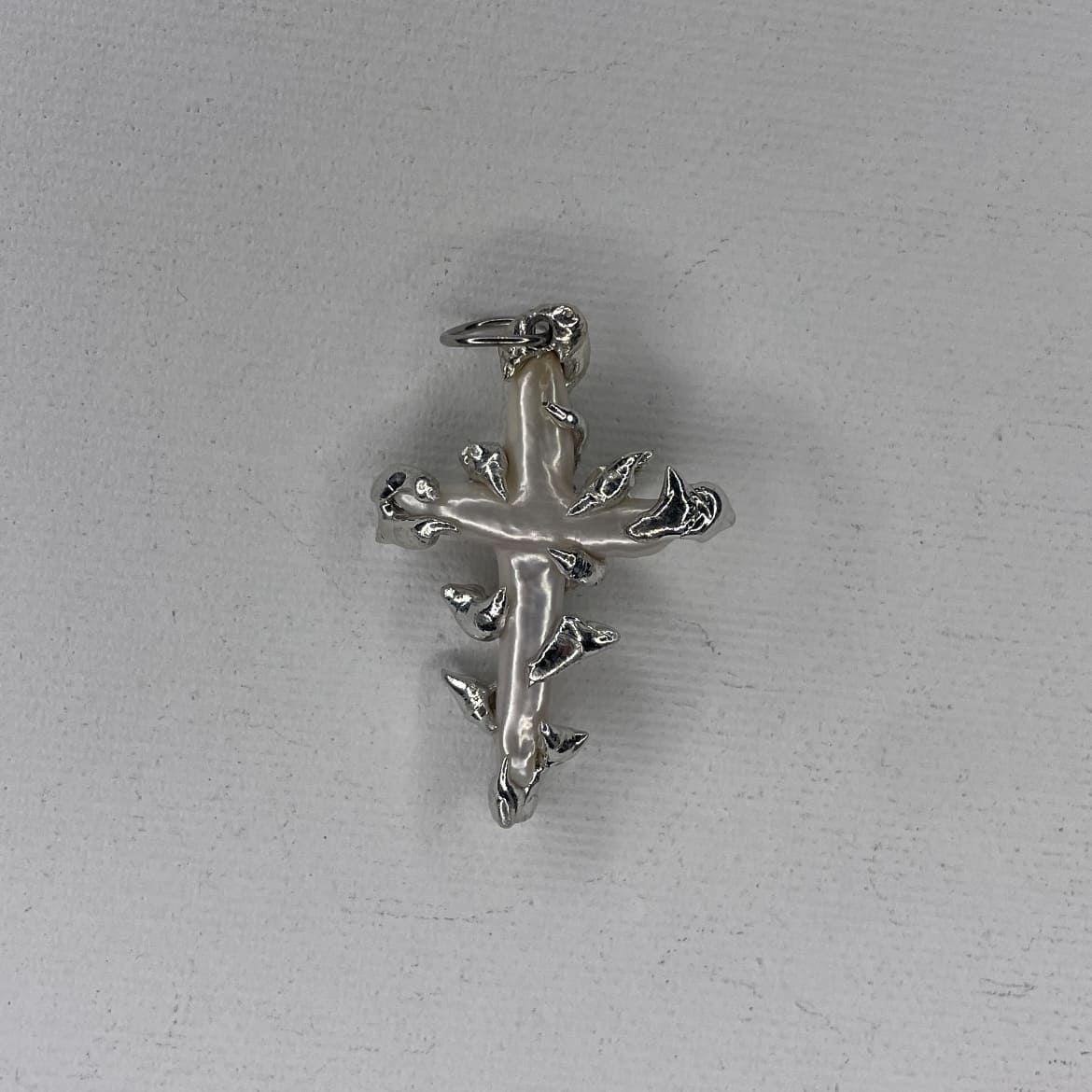 beholding cross pendant