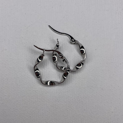 curved steel earrings