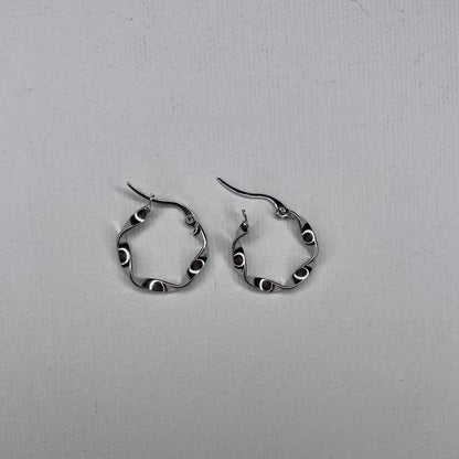 curved steel earrings