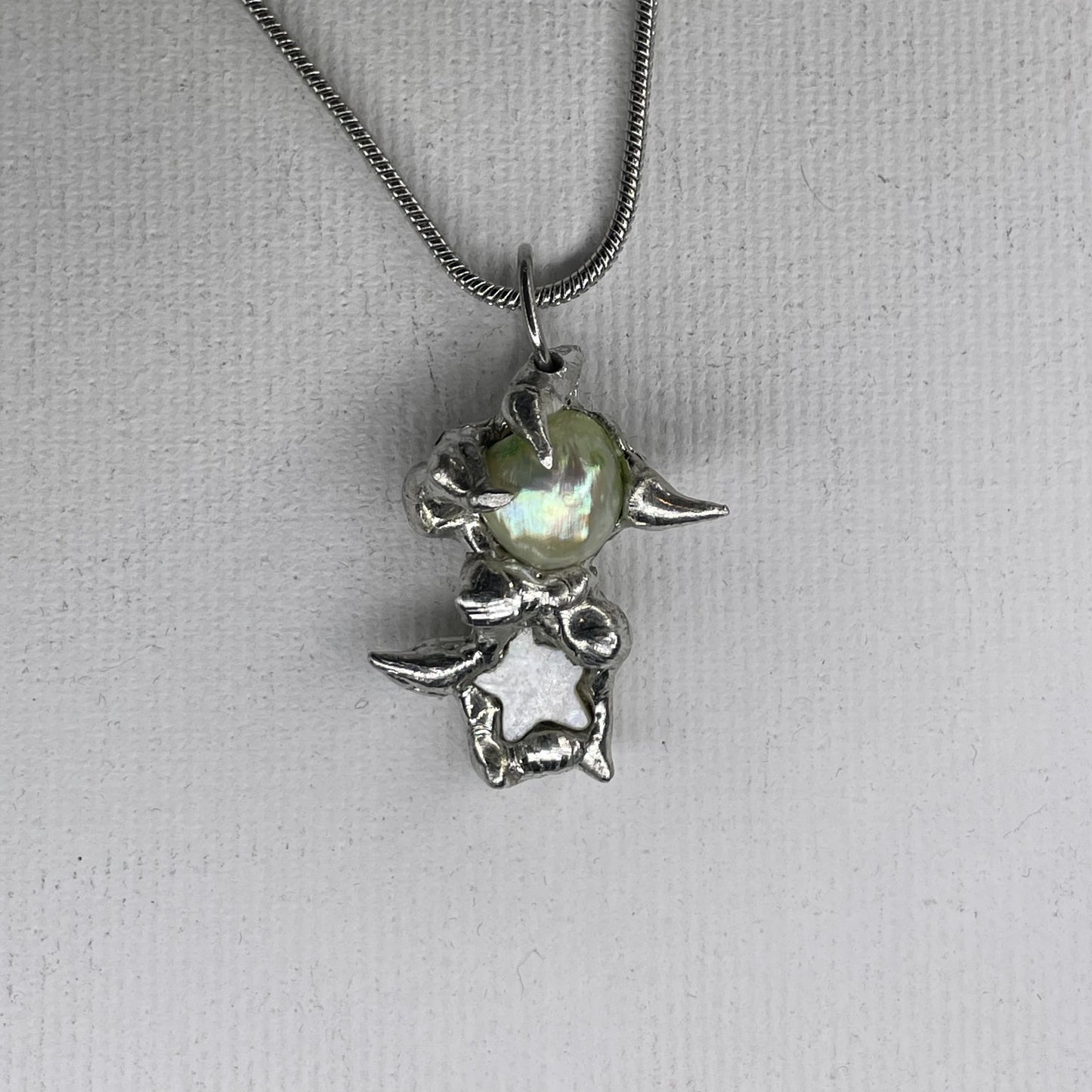 caring star pendant