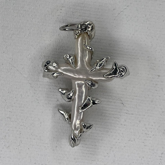 beholding cross pendant