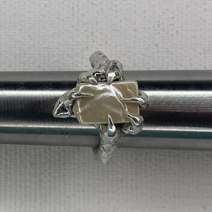 captured nacre ring